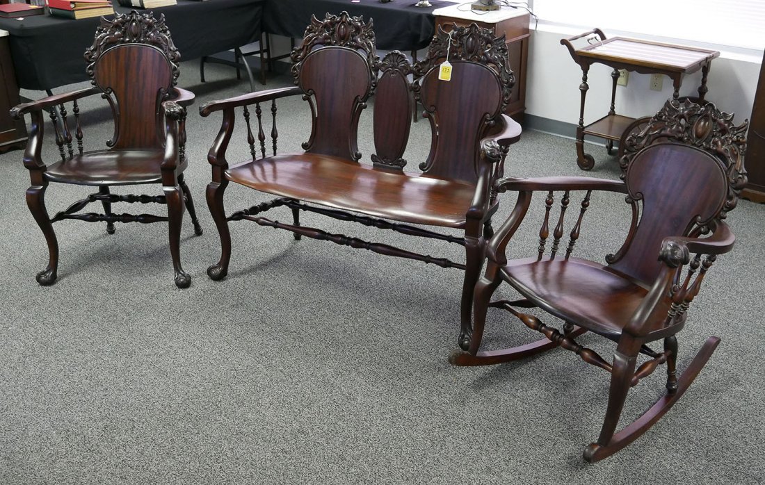 3 Pc Carved Winged Gryphon Mahogany Chair Suite: Consisting of matching armchair, settee, and rocker, this gorgeous suite, adorned with winged griffins, was made of high-grade, Honduras mahogany. Fine condition except for the fronts of the arms of t