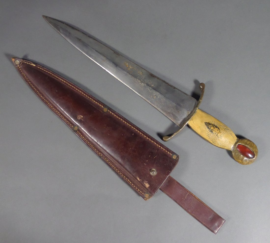 Jeweled Viking Style Dagger Knife Scrimshaw: 17" long overall, this large knife is likely a "fantasy" piece, handmade from brass and steel, with a jeweled hilt and a scrimshawed image of what appears to be a bearded Viking on the handle. Good co