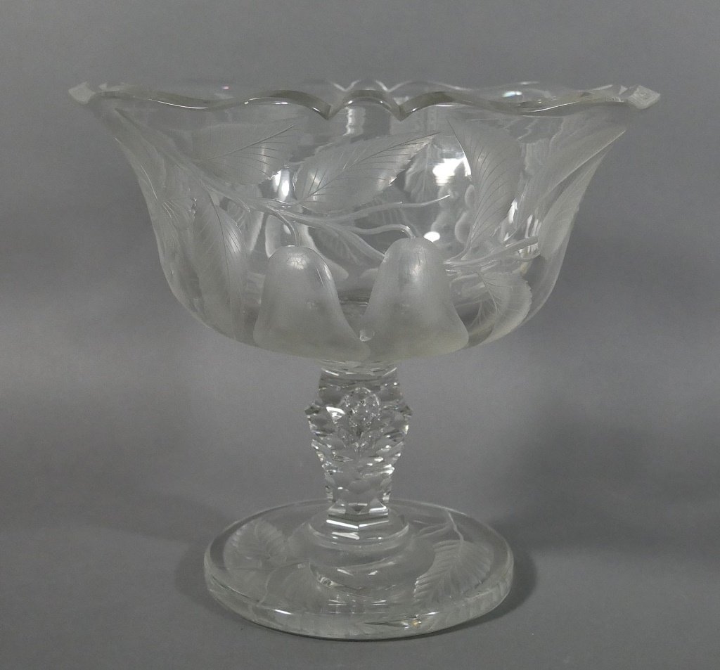 BACCARAT Intaglio Cut Glass Fruit Bowl: 9" tall and about 10" in diameter. Unsigned, but definitely Baccarat style and quality. Teardrop air bubble in stem. Deep cut fruit.