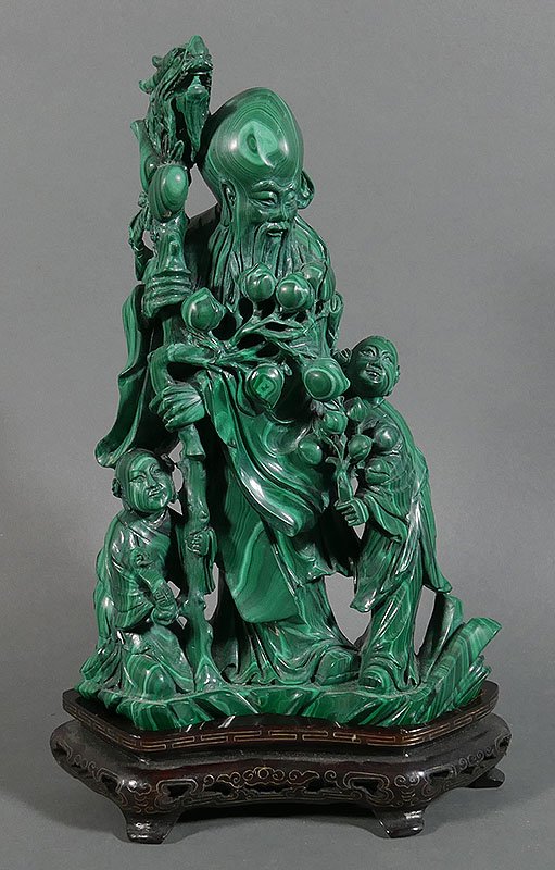 Carved MALACHITE Chinese Immortal Statue 10": Massive, ornately carved malachite statue of Chinese immortal with two children. Measures 10" high (11-1/2" on silver wire decorated plinth). Signed with incised chop mark on base. Excellent condition