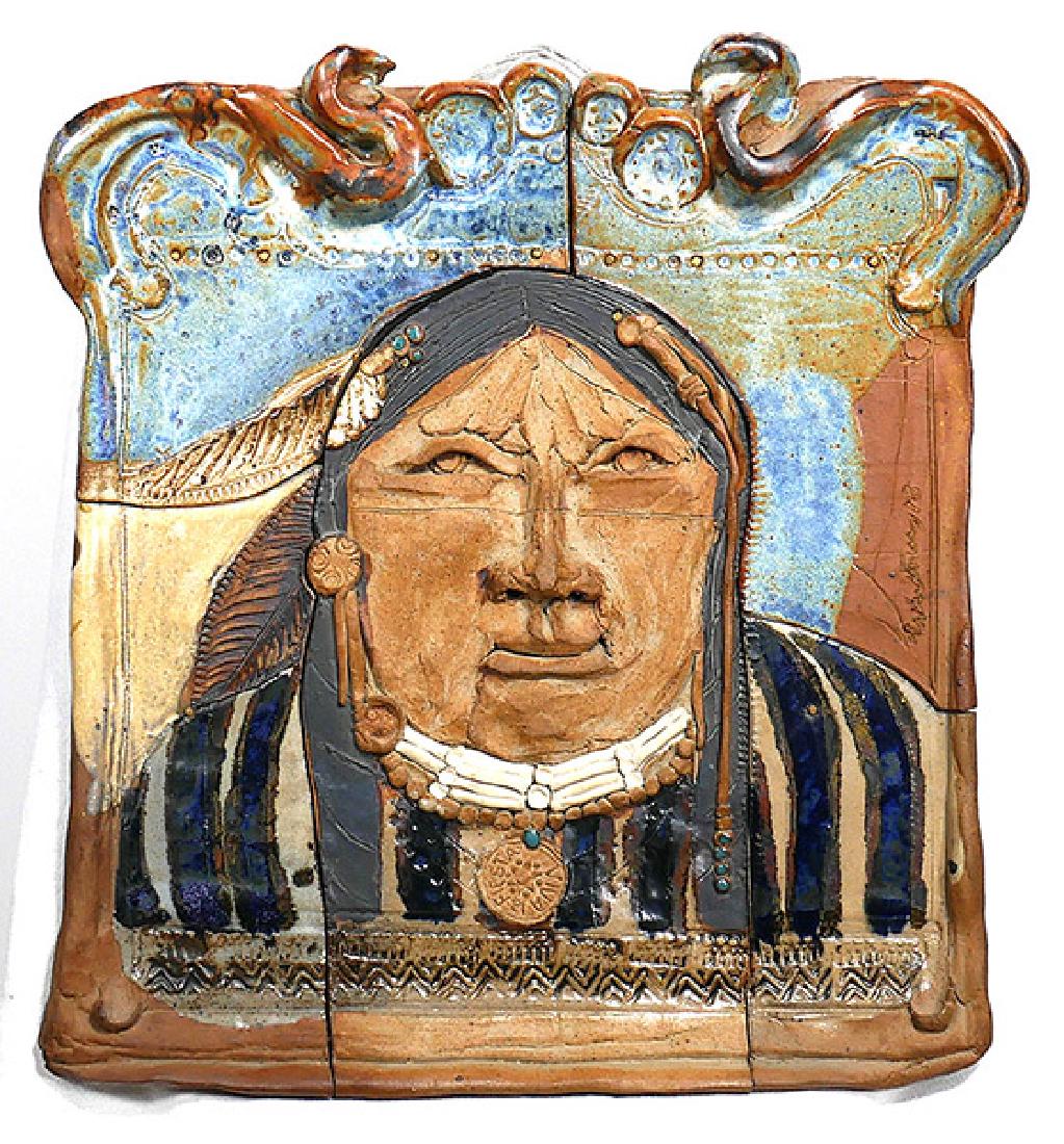 CAROL WHITNEY Ceramic Native American Sculpture: Native American Indian sculpture plaque by Carol Whitney (American, b. 1936), measuring 19-1/2" x 21-1/2" x 2". This very piece once hung in the Oklahoma governor's mansion. Whitney, who is part Sioux