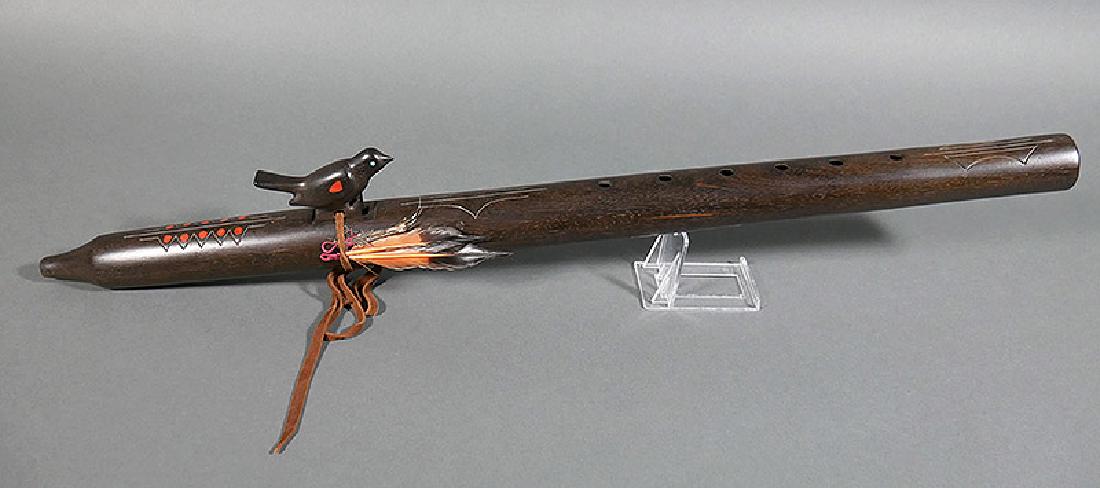PHILLIP HAOZOUS Apache Carved FLUTE Allan Houser: Ebony Apache flute with turquoise and coral inlay, attributed to Phillip Haozous, son of renowned artist Allan Houser. We've no idea how to play this instrument, but it doesn't appear to have any comp
