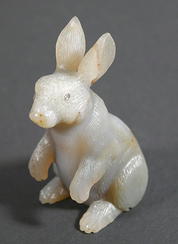 FABERGE Carved Hardstone RABBIT w Diamond Eyes: Gorgeous carved chalcedony rabbit, attributed to Faberge, measuring 3-3/8" high and exquisitely detailed. White gold or platinum bezel-set (tested) diamonds for eyes. Excellent condition. Obtained wit