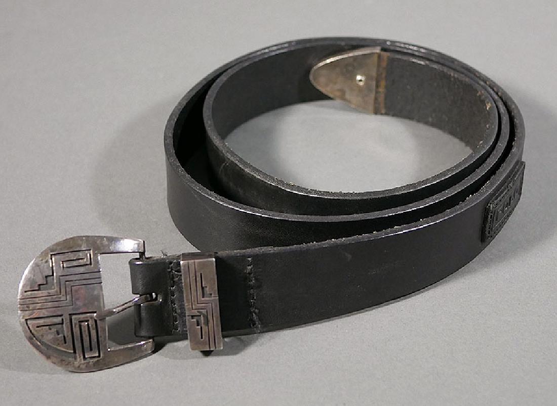 Hopi Sterling Silver Belt Buckle Phil Poseyesva: Fine handmade Native American Hopi sterling silver belt buckle signed with mark of Philbert Poseyesva. Belt made by Polo. Size 44.