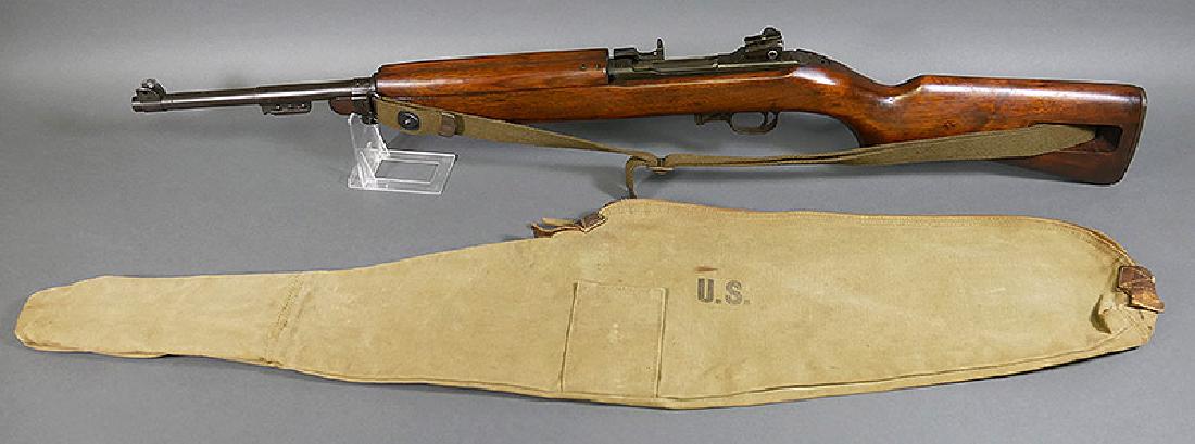 1945 WINCHESTER M1 CARBINE .30 Cal Rifle WWII: Fine Winchester M1 carbine. 18" bbl. No mags. Wonderful condition, appears not to have been issued. Original sling and period cloth zipper bag (dated 1943). Parkerized finish and furniture are excelle