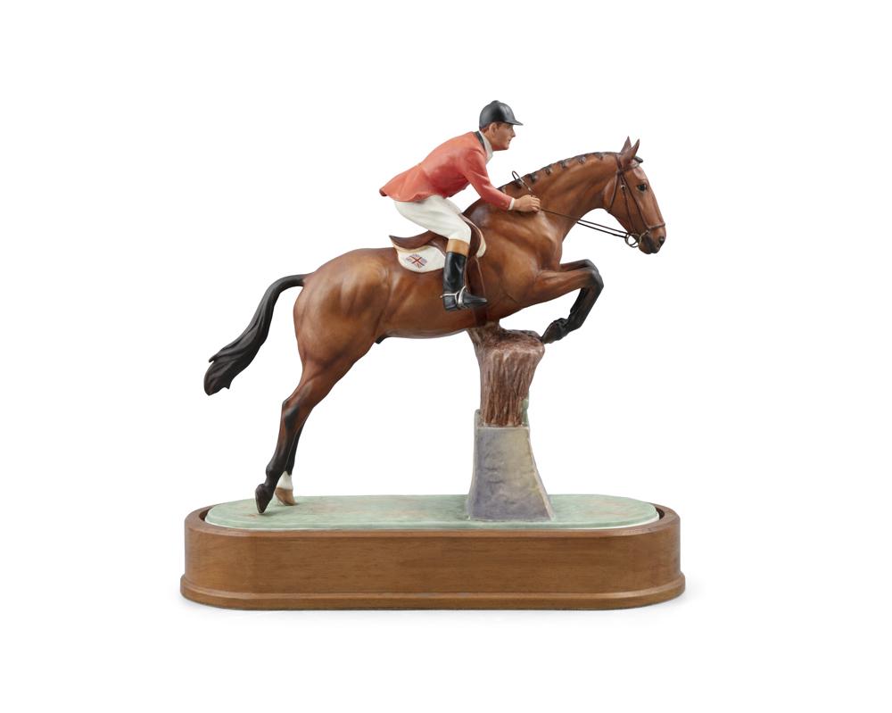 A ROYAL WORCESTER PORCELAIN MODEL OF FOXHUNTER AND LT.: A ROYAL WORCESTER PORCELAIN MODEL OF FOXHUNTER AND LT. COL. H.M. LLEWELLYN CBE, modelled by Doris Lindner, model no.47/500, set into an oval timber base. 28 x 8.6 x 27.5cm high
