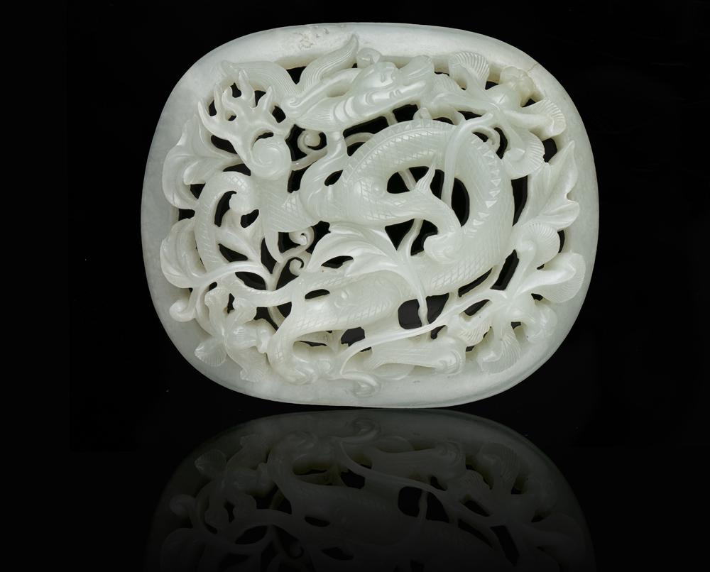 AN OPEN-WORKED WHITE JADE 'DRAGON' PLAQUE (1 of 6)