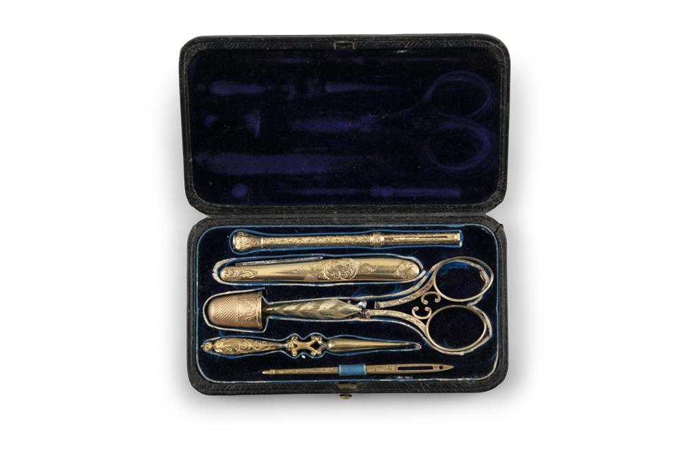 A VICTORIAN GILTMETAL ETUI, in a gilt tooled leather (1 of 1)