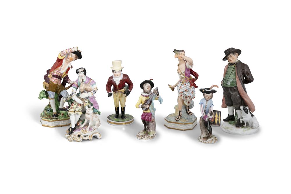 A COLLECTION OF 18/19TH CENTURY PORCELAIN FIGURES,: A COLLECTION OF 18/19TH CENTURY PORCELAIN FIGURES, comprising a 19th Century Meissen figure of a portly Gentleman with a dog, cross swords, incised numerals, 16cm high; together with an 18th Century D