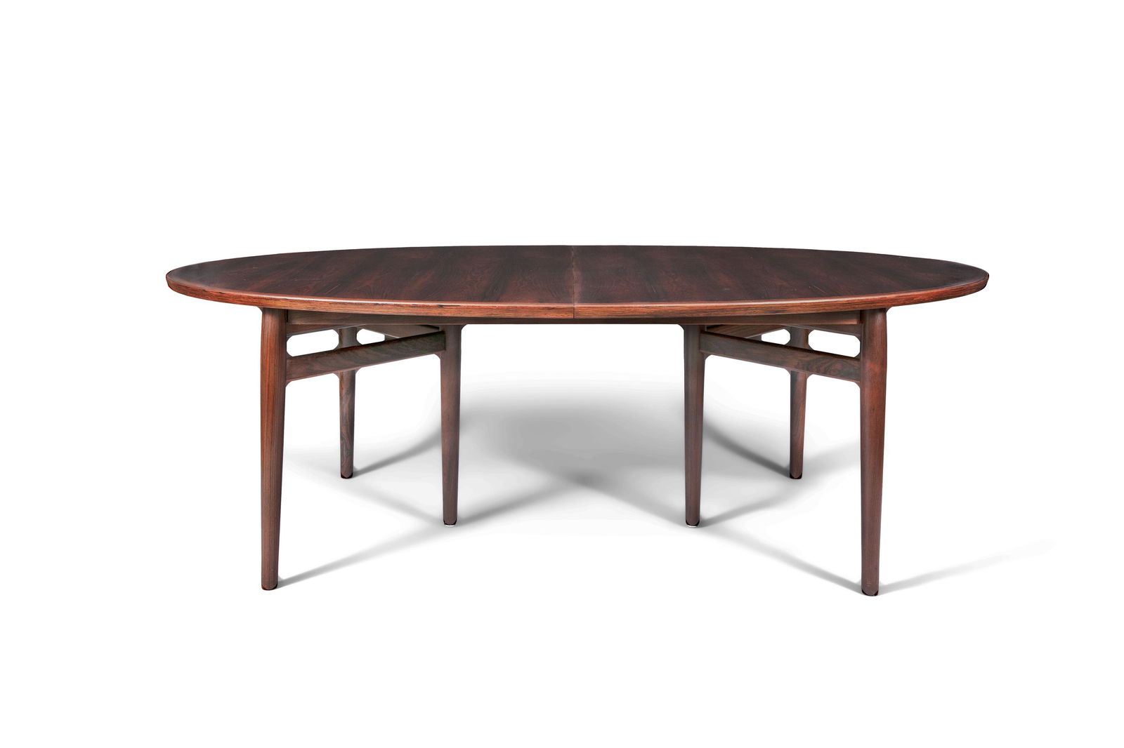 ARNE VODDER (1926 - 2009) A rosewood Model 212: ARNE VODDER (1926 - 2009) A rosewood Model 212 extending dining table by Arne Vodder for Sibast, with two additional leaves, Denmark c.1960. 200/250/300 x 124 x 72cm (h)