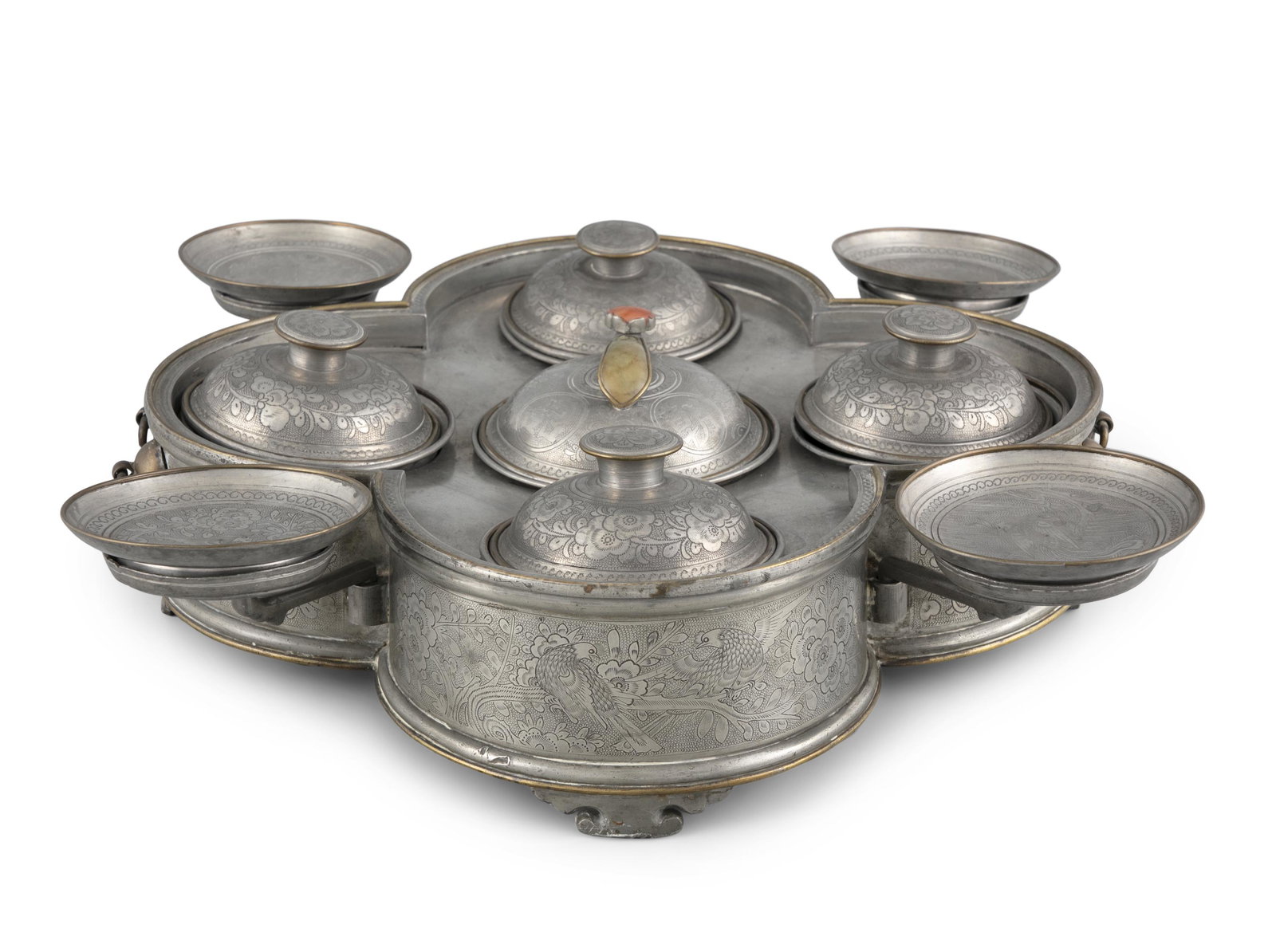 A CHAOYANG PEWTER SWEET MEAT WARMER, CONTAINER AND: A CHAOYANG PEWTER SWEET MEAT WARMER, CONTAINER AND SERVING DISH China, Guangdong, Chaozhou, Late Qing Dynasty, Circa 1900 Comprised of a large lobed food box / warmer applied with two loose ring handl
