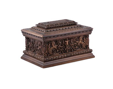 AN ITALIAN RENAISSANCE STYLE HARDWOOD CASKET, of rectangular shape with domed cover enclosing a: AN ITALIAN RENAISSANCE STYLE HARDWOOD CASKET, of rectangular shape with domed cover enclosing a lined interior, the exterior carved with classical figures and scrollwork. 44cm wide, 29cm high