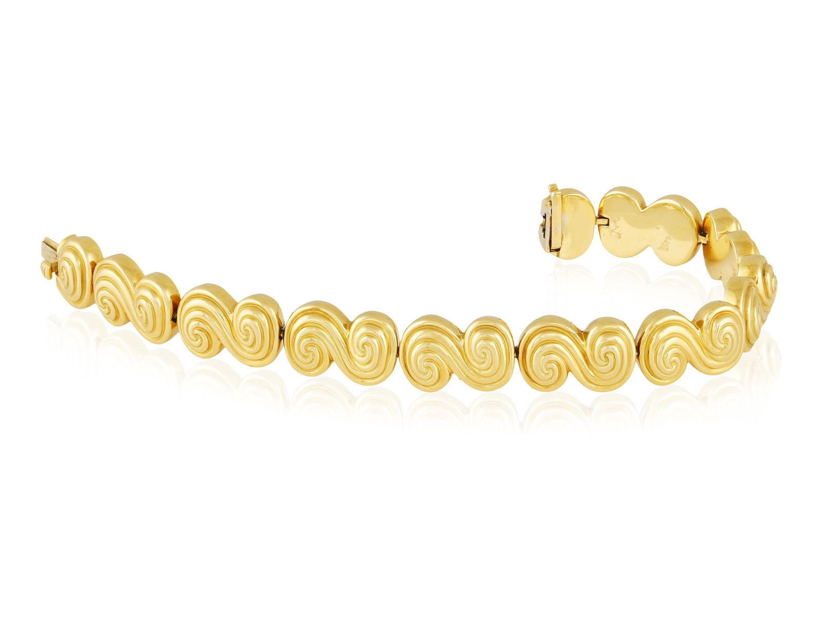 A GOLD BRACELET, BY TIFFANY & CO., CIRCA 1990  Designed as a continuous line of double spiro swirl (1 of 6)