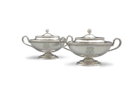 A PAIR OF GEORGE III NAVETTE-SHAPED SILVER SAUCE TUREENS AND COVERS, London c.1777, maker's mark of: A PAIR OF GEORGE III NAVETTE-SHAPED SILVER SAUCE TUREENS AND COVERS, London c.1777, maker's mark of Robert Makepeace & Richard Carter, the oval stepped domed lids with urn finials, the plain bodies ce