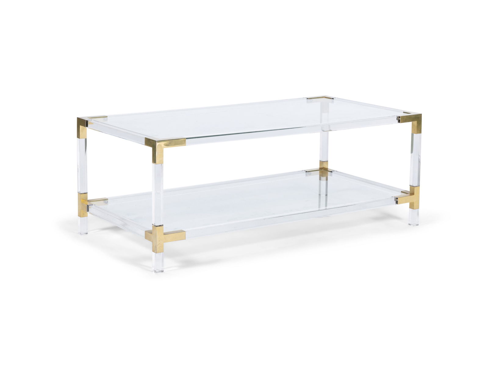 PIERRE VANDEL A two tier coffee table attrib. to Pierre Vandel. Lucite with gilt metal detailing and: PIERRE VANDEL A two tier coffee table attrib. to Pierre Vandel. Lucite with gilt metal detailing and glass tops. France, c.1970. 105 x 55 x 41cm(h)