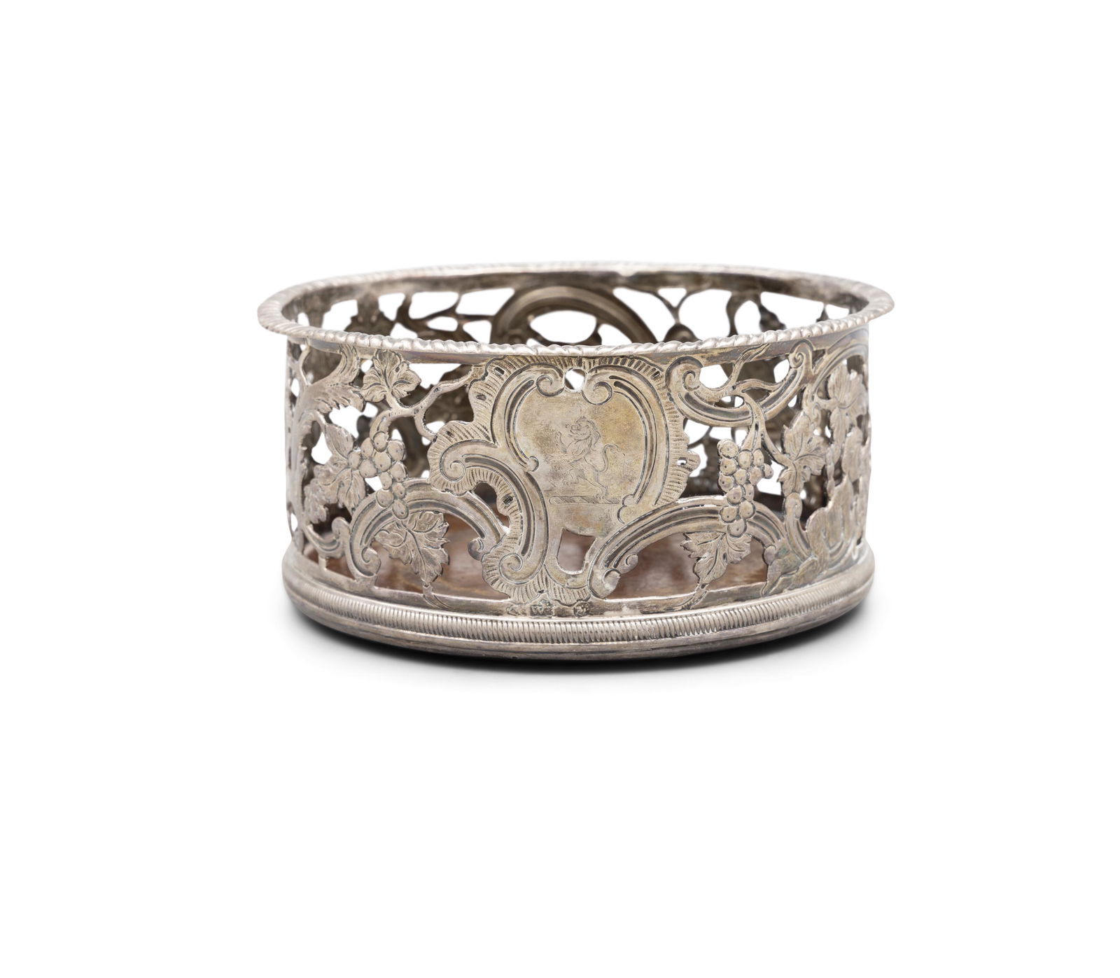 AN IRISH GEORGIAN SILVER CIRCULAR DECANTER COASTER  Dublin c.1780, with gadroon rim above pierced (1 of 3)