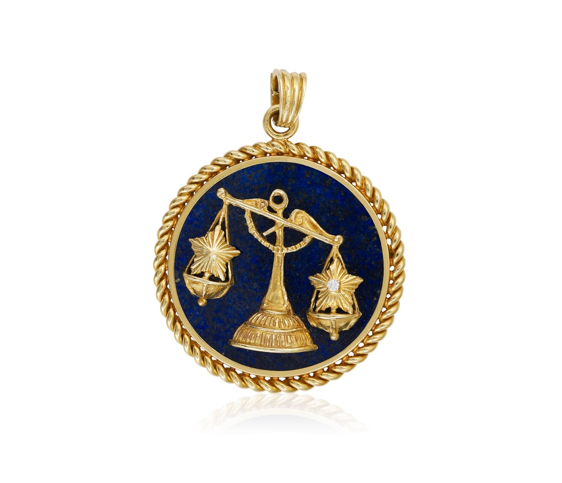 A LAPIS LAPIS LAZULI AND DIAMOND ZODIAC PENDANT, BY VAN CLEEF & ARPELS, CIRCA 1970  The circular lap (1 of 8)
