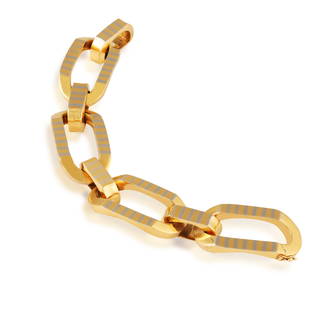 A COLLECTIBLE RETRO BRACELET, BY BULGARI, CIRCA 1960 Composed of four elongated cable links with: A COLLECTIBLE RETRO BRACELET, BY BULGARI, CIRCA 1960 Composed of four elongated cable links with bi-coloured gold striped detailing to similar connector links, in 18K gold, signed Bvlgari, numbered BV