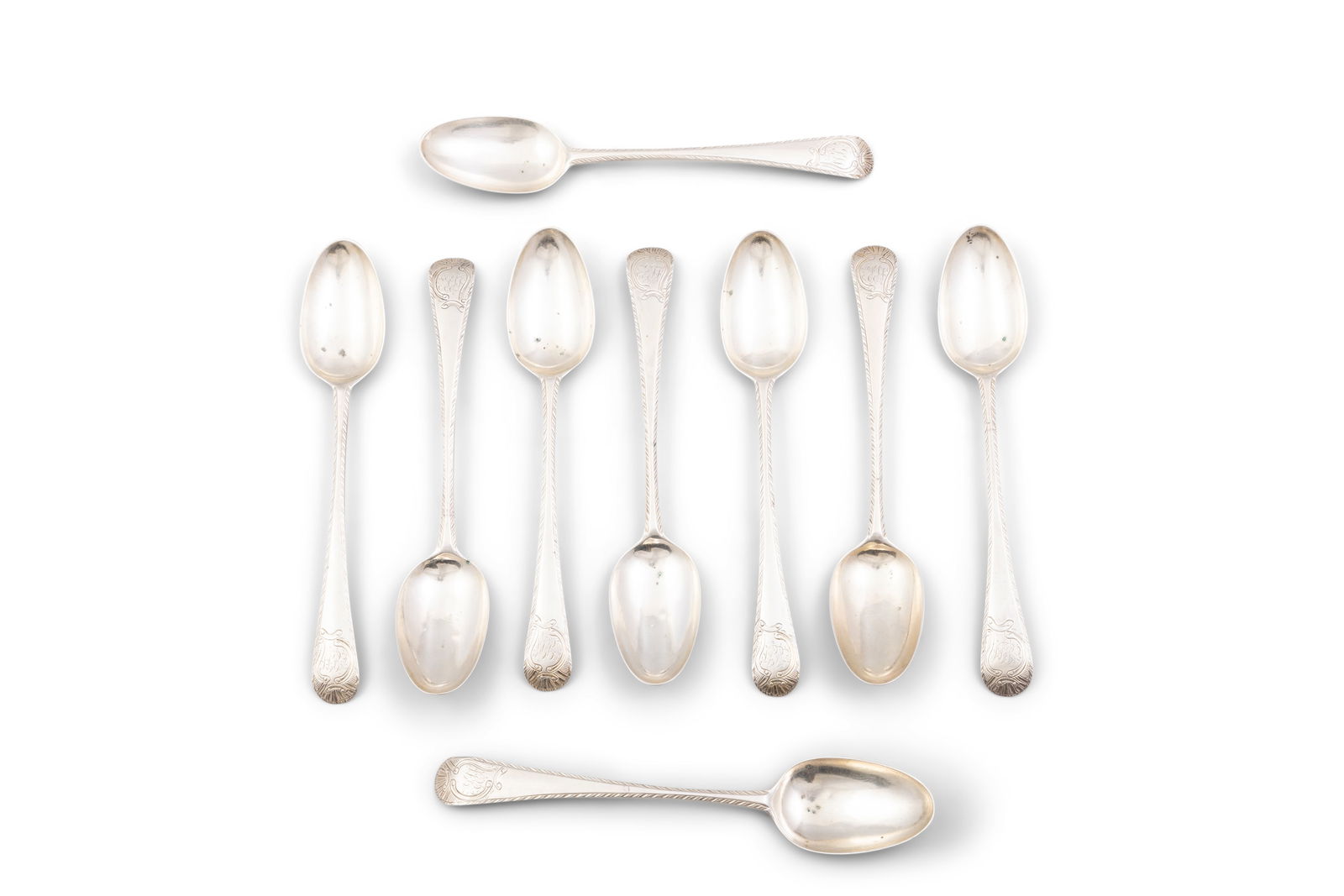 A SET OF NINE IRISH SILVER DESSERT SPOONS, Dublin c. 1775 -1787, mark of William Ward, (9.1 troy: A SET OF NINE IRISH SILVER DESSERT SPOONS, Dublin c. 1775 -1787, mark of William Ward, (9.1 troy ozs all in). Each approx. 18cm long