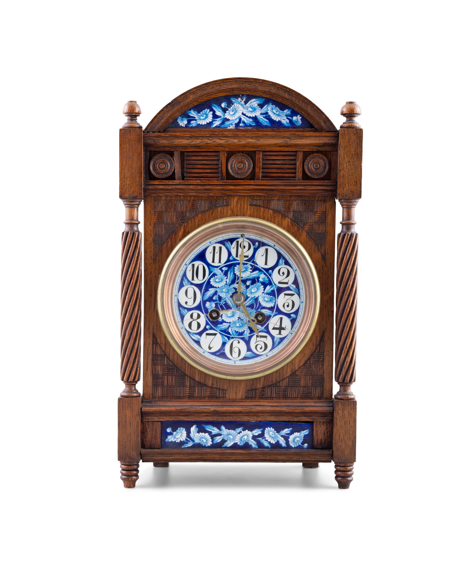 AN ARTS & CRAFTS STAINED OAK CASED MANTLE CLOCK,   in the style of Lewis F Day, the arch top with (1 of 5)