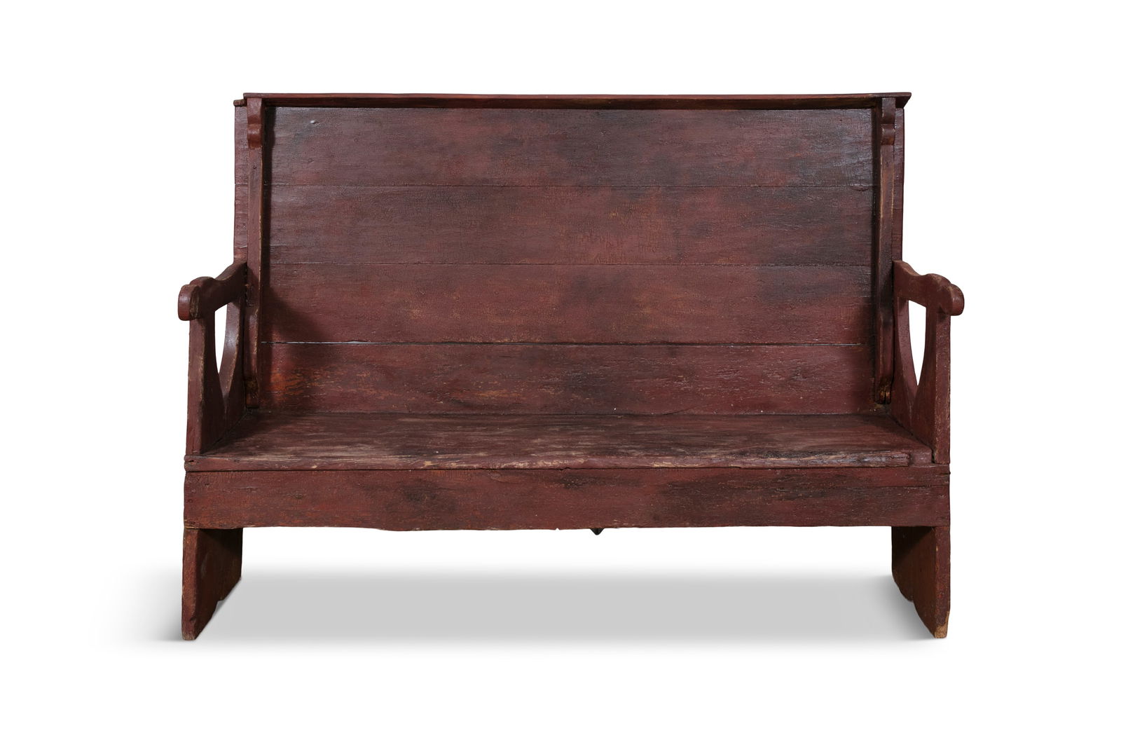 A 19TH CENTURY PAINTED SETTLE BENCH, the high panel back with carved shaped supports above a plain : A 19TH CENTURY PAINTED SETTLE BENCH, the high panel back with carved shaped supports above a plain seat and carved open arm rests raised on trestle supports. 136cm high, 184cm wide and 59cm deep Prove