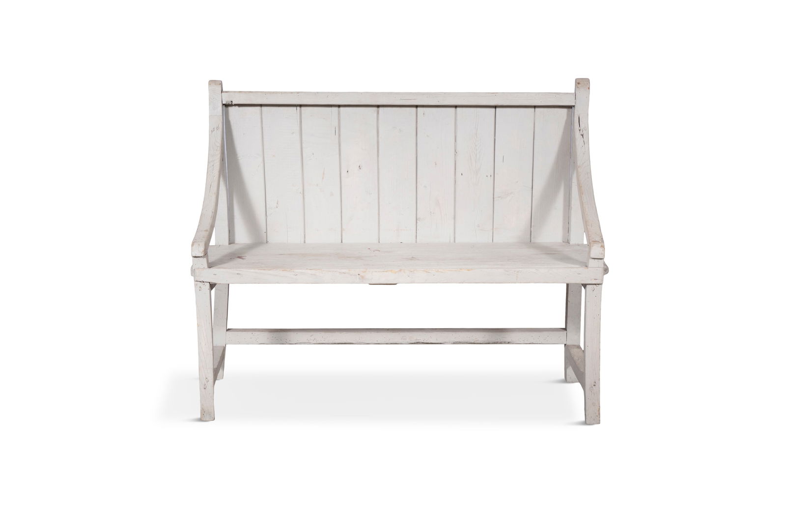 A 19TH CENTURY PINE LOW BENCH, splat back with downward sweeping arms raised on square legs joined : A 19TH CENTURY PINE LOW BENCH, splat back with downward sweeping arms raised on square legs joined by a stretcher to the rear. 85cm high, 102.5cm wide, 46.5cm deep Provenance: Co. Wexford