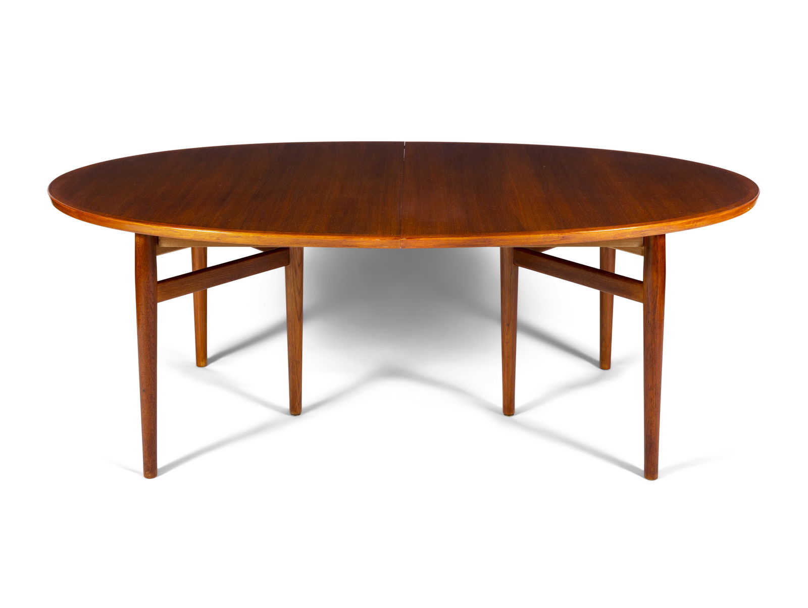 ARNE VODDER (1926-2009) A teak oval extending dining table with two leaves by Arne Vodder. Denmark,: ARNE VODDER (1926-2009) A teak oval extending dining table with two leaves by Arne Vodder. Denmark, c.1960. 198/248/298 x 124 x 72cm(h)