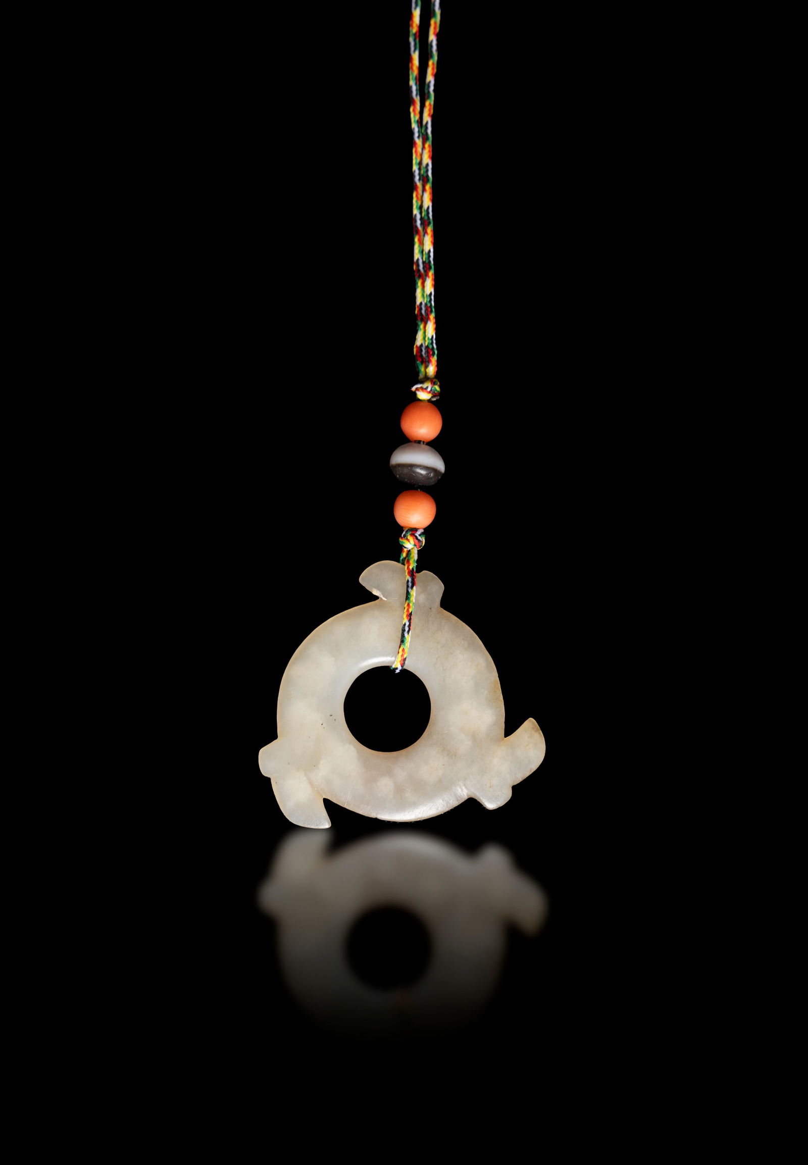 AN ARCHAIC BROWNISH AND RUSSET JADE NOTCHED DISC (XUANJI)  商代风格 玉 (1 of 1)