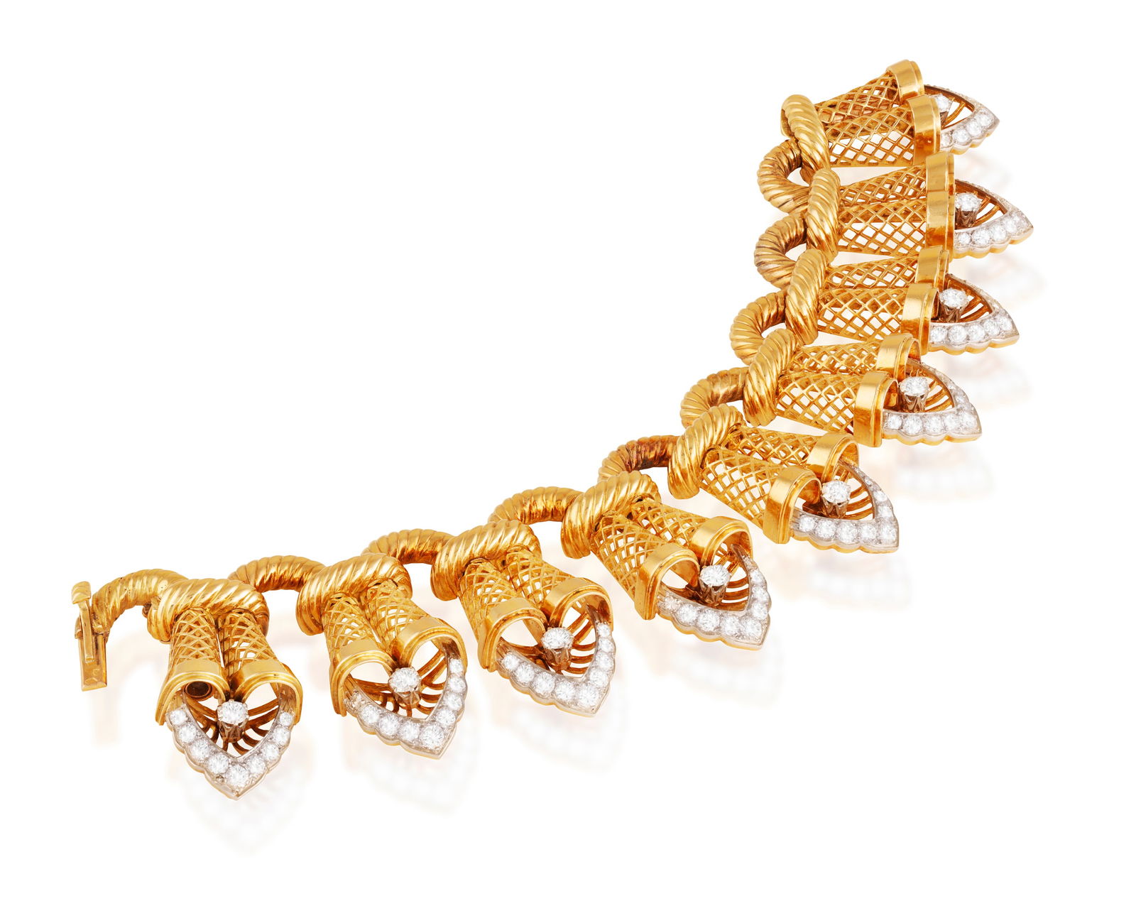 VERGER FRÈRES: A RETRO DIAMOND BRACELET, CIRCA 1945-50  Of openwork scrolled design, composed o (1 of 7)