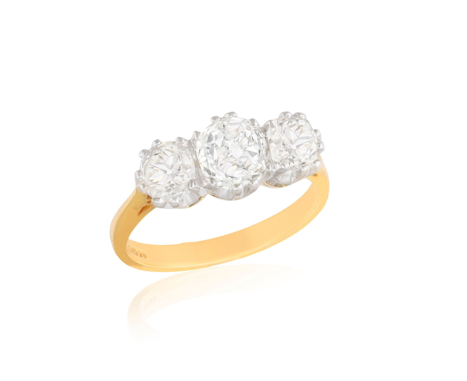 A DIAMOND THREE-STONE RING  Composed of a central old cushion-shaped diamond weighing approximately (1 of 3)