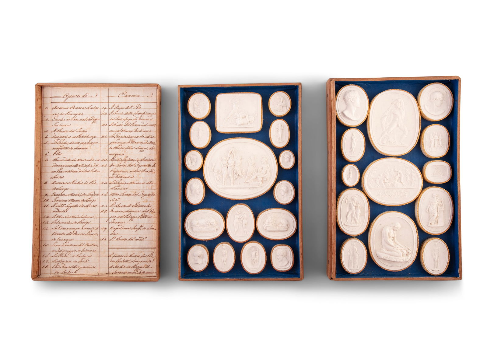 PIETRO PAOLETTI (1801 - 1847) A collection of thirty Grand Tour plaster intaglios, contained in: PIETRO PAOLETTI (1801 - 1847) A collection of thirty Grand Tour plaster intaglios, contained in two trays within a plain timber box, the inside lid listing the individual titles under the heading 'Ope