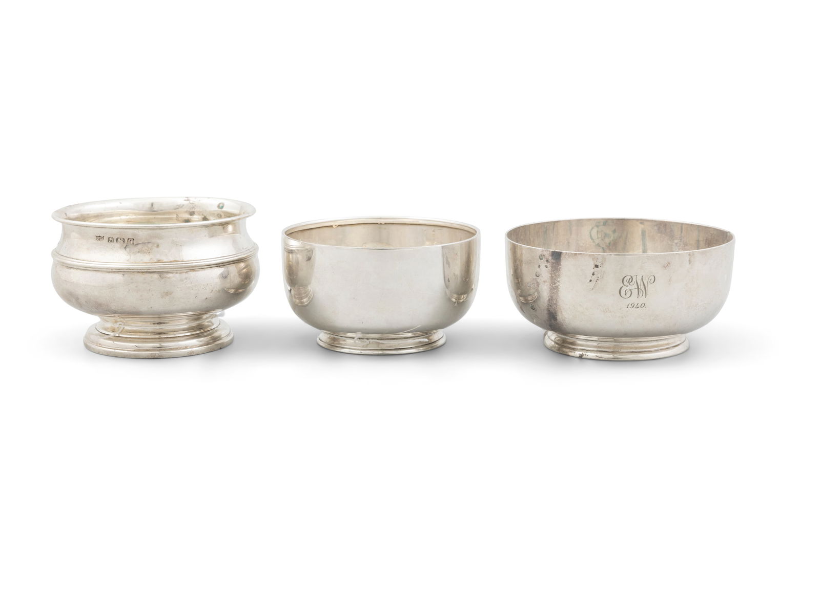 A COLLECTION OF THREE SILVER BOWLS of plain circular form, comprising Dublin, c.1885, mark of: A COLLECTION OF THREE SILVER BOWLS of plain circular form, comprising Dublin, c.1885, mark of Edmund Johnson; London, c. 1939, mark of 'C.E' Birmingham, c.1946, mark of Mappin & Webb (14.8 troy ozs al
