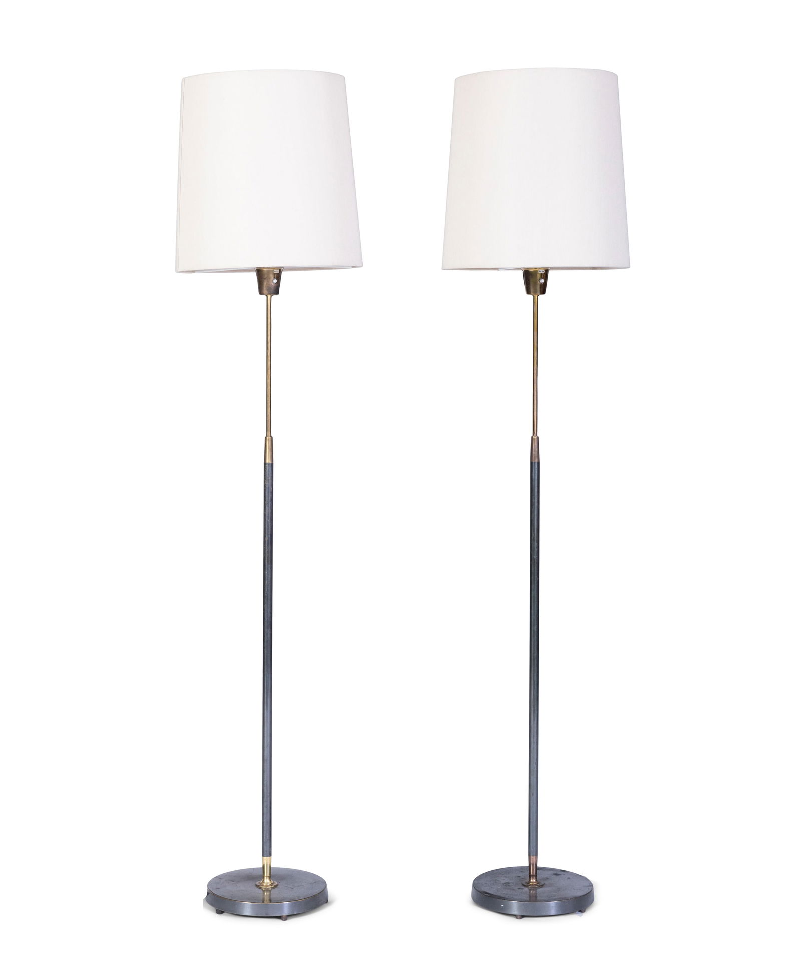 FALKENBERG A pair of Falkenberg floor lamps with brass detailing. With maker's label. Sweden,: FALKENBERG A pair of Falkenberg floor lamps with brass detailing. With maker's label. Sweden, c.1970. 157cm(h)