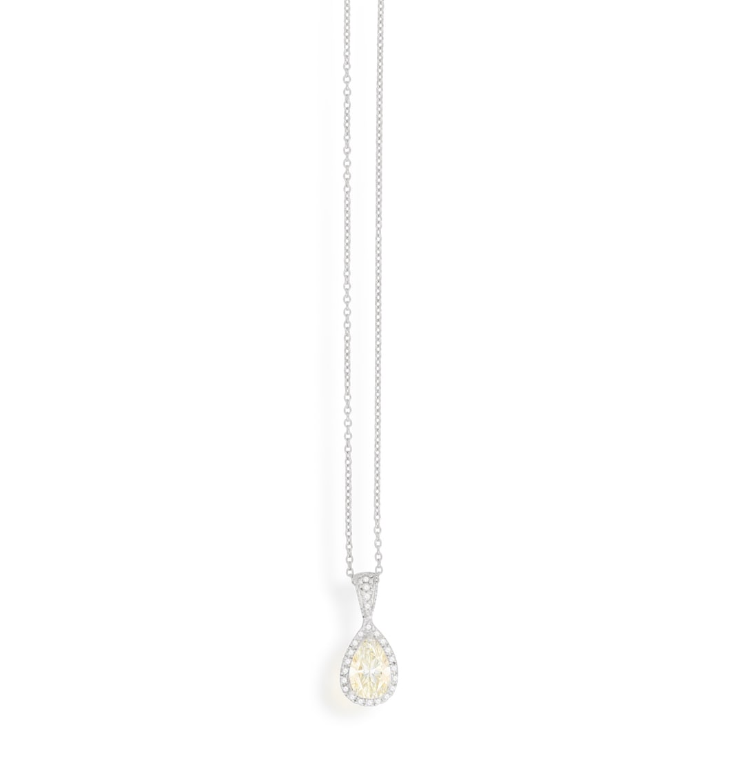 A DIAMOND PENDANT ON CHAIN The pear-shaped diamond weighing approximately 1.60cts within a: A DIAMOND PENDANT ON CHAIN The pear-shaped diamond weighing approximately 1.60cts within a three-claw setting, to a brilliant-cut diamond surround and bale, mounted in 18K gold, pendant length (includ