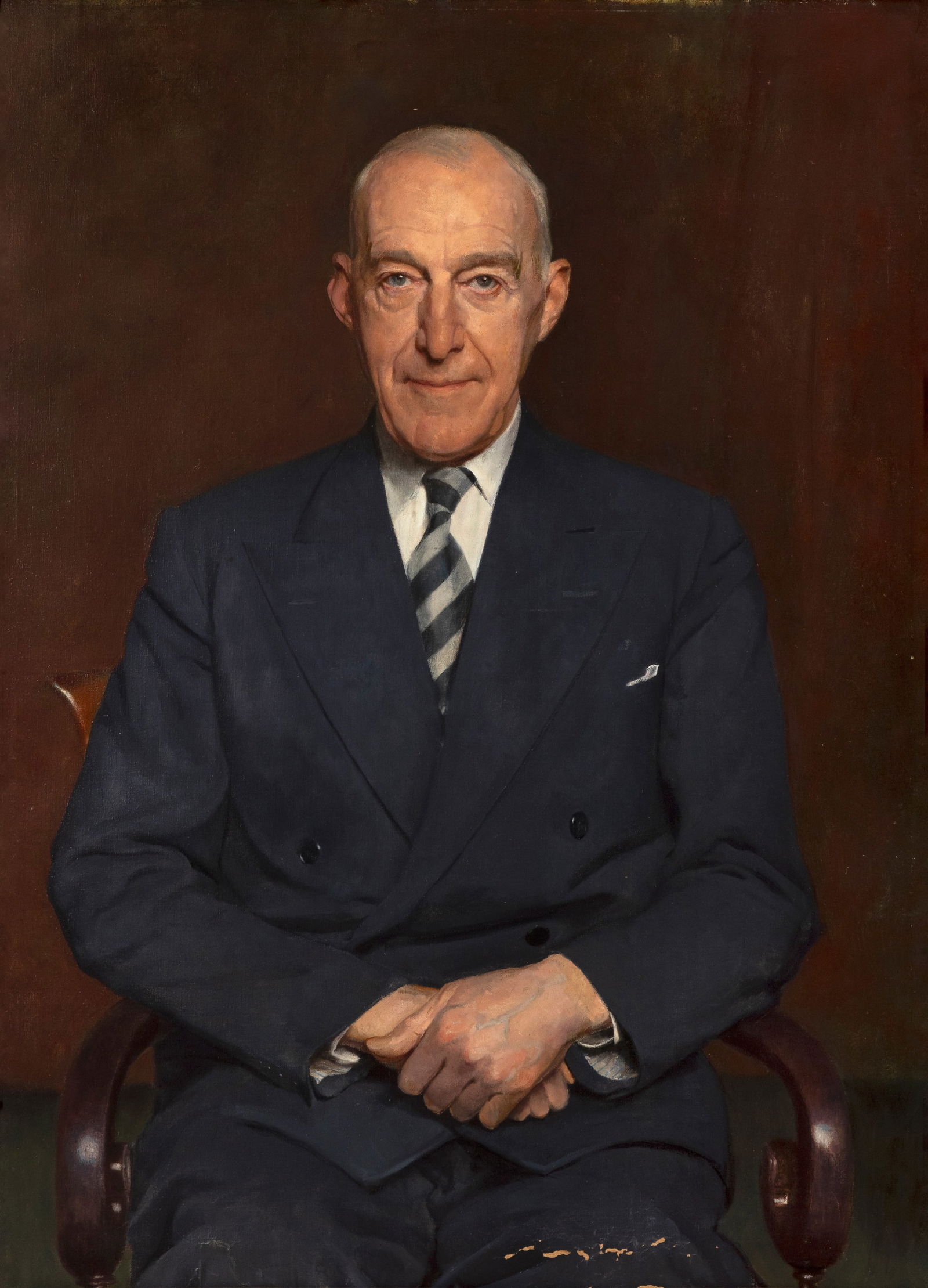 Sir Gerald Festus Kelly PRA RHA HRSA (1879 - 1972) Portrait of Sir Kenneth Lee, Seated, 3/4 Length: Sir Gerald Festus Kelly PRA RHA HRSA (1879 - 1972) Portrait of Sir Kenneth Lee, Seated, 3/4 Length in a Grey Suit, Oil on canvas, 100 x 75.6cm (39½ x 29¾'') Provenance: Christies, South Kens