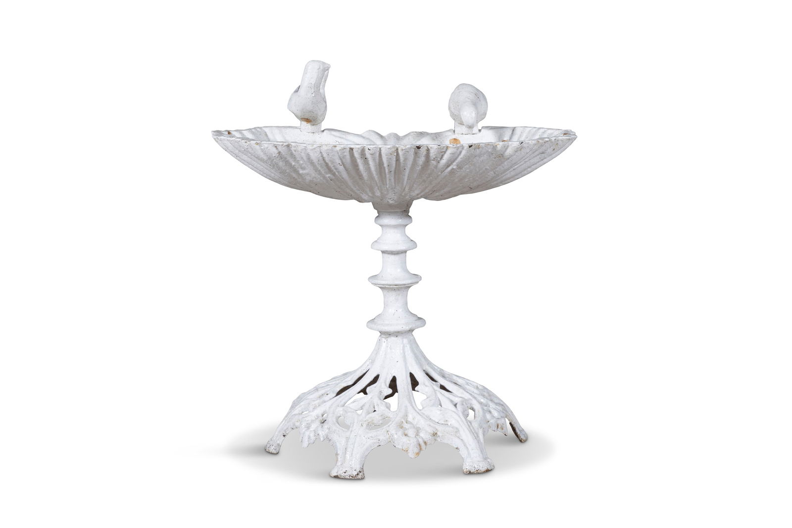 A VICTORIAN WHITE PAINTED CAST IRON SHELL SHAPED BIRD BATH, with two ornamental birds drinking,