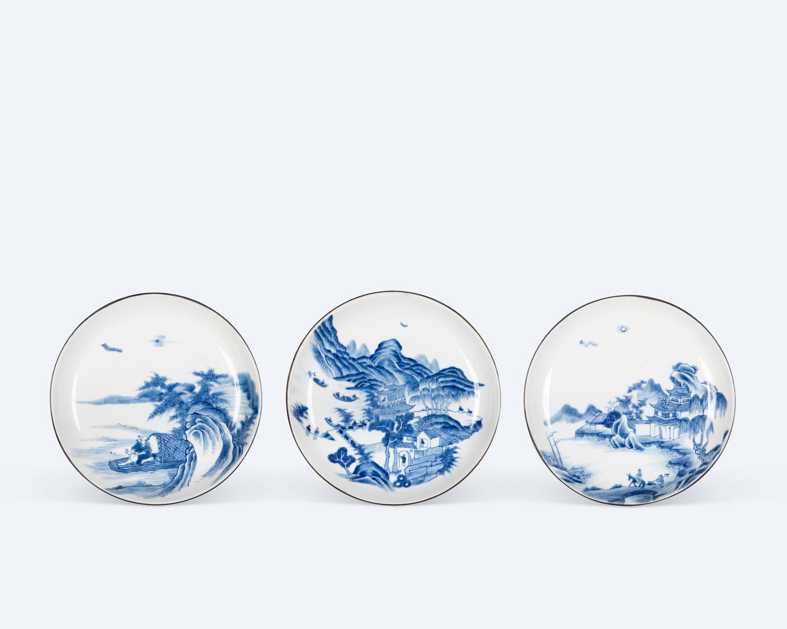 A GROUP OF THREE 'BLEU DE HUE' DISHES  Vietnam, 19/20th century   All pieces with metal rims. Signed (1 of 4)