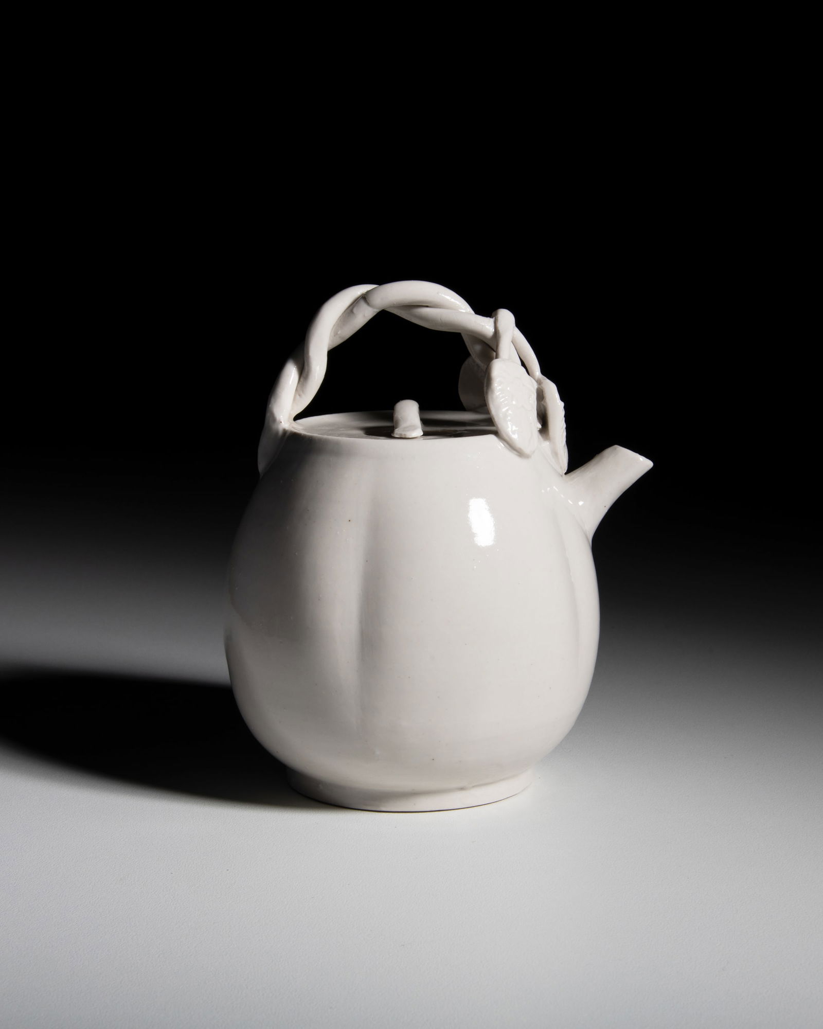 A DING STYLE MELON-SHAPED EWER   ___ _________   China, Ming dynasty  The vessel features a lobed, (1 of 5)