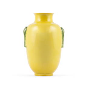 AN IMPERIAL YELLOW AND GREEN ENAMELLED RELIEF DECORATED PORCELAIN VASE  __ ___ ___   China, Qing: AN IMPERIAL YELLOW AND GREEN ENAMELLED RELIEF DECORATED PORCELAIN VASE __ ___ ___ China, Qing Dynasty, Daoguang mark and possibly the period of lantern shape, all covered with a yellow glaze, with two