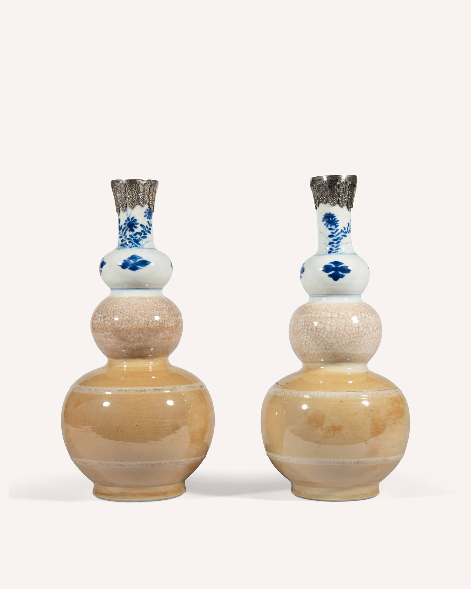 A PAIR OF CAFE AU LAIT AND BLUE AND WHITE TRIPLE GOURD VASES ___ _________ China, Kangxi period