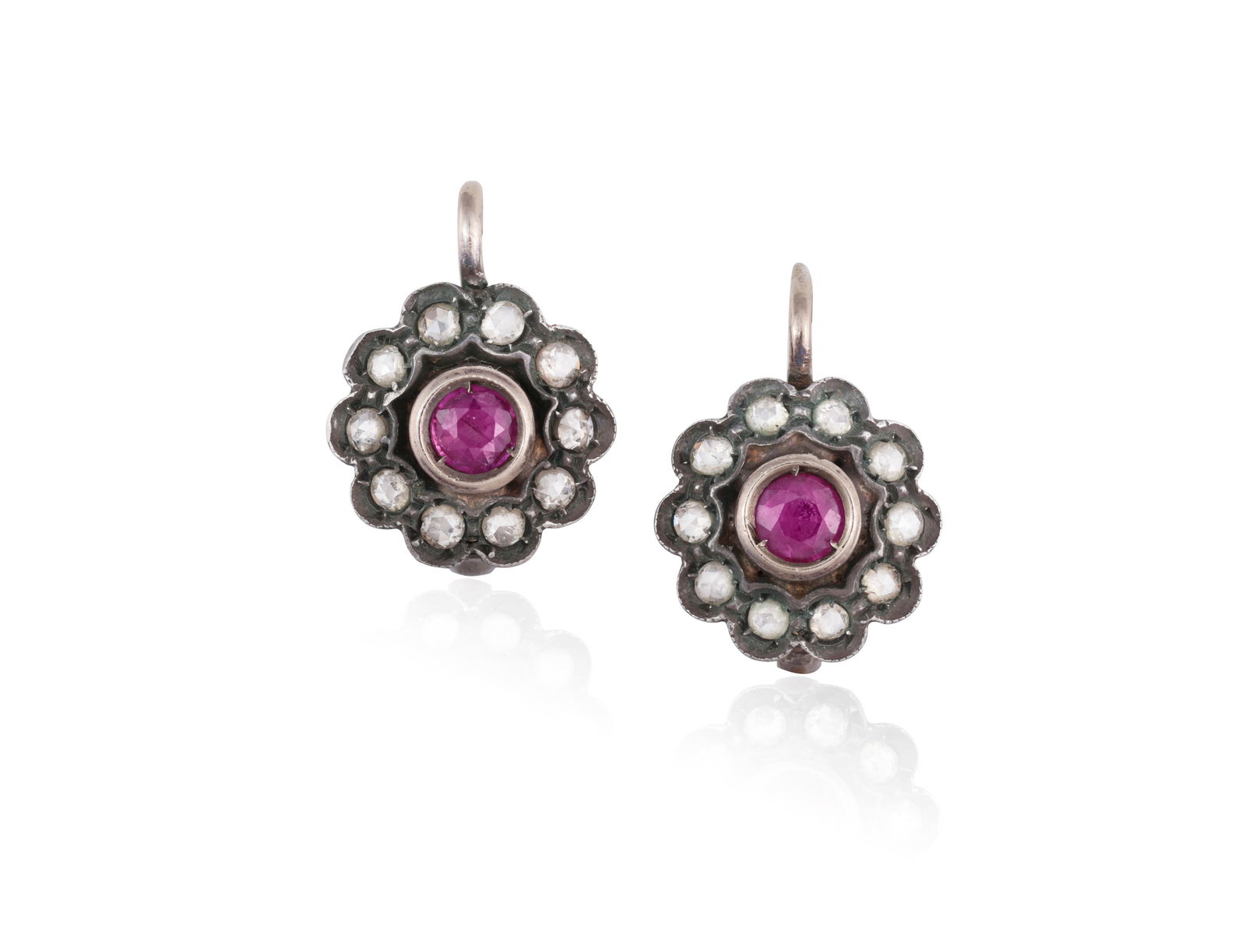 A PAIR OF RUBY AND DIAMOND EARRINGS  Each of cluster design, set with a circular-cut ruby, within a (1 of 2)