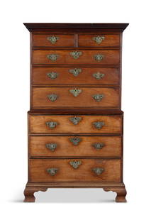 A GEORGE III MAHOGANY TALLBOY CHEST,   the upper section with dentil cornice above two short and: A GEORGE III MAHOGANY TALLBOY CHEST, the upper section with dentil cornice above two short and three long drawers, all fitted with pierced brass bracket handles, the lower section with three further g