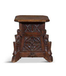 A GOTHIC REVIVAL CARVED OAK STOOL, 19TH CENTURY, shaped square top over carved frieze and supports: A GOTHIC REVIVAL CARVED OAK STOOL, 19TH CENTURY, shaped square top over carved frieze and supports decorated with quatrefoils and supports applied with carved female figures