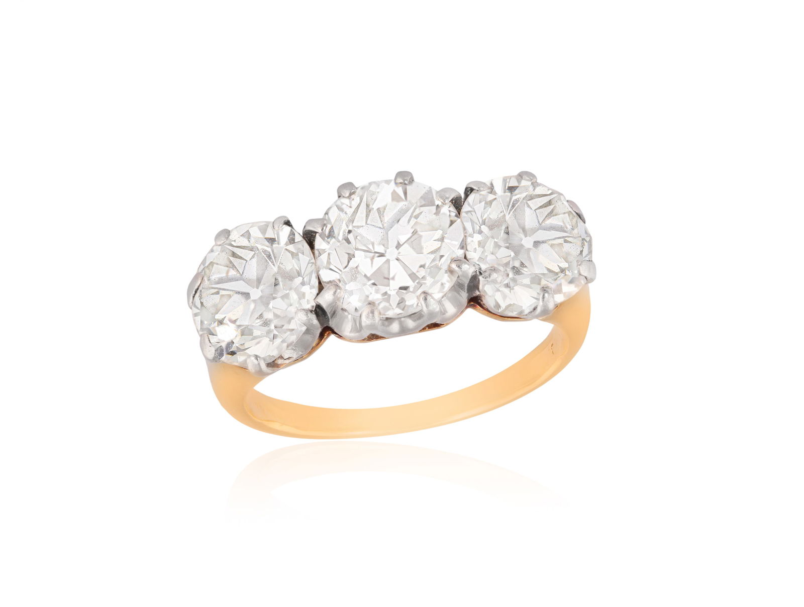 AN EARLY 20TH CENTURY DIAMOND THREE-STONE RING  Composed of three old European-cut diamonds, within (1 of 2)
