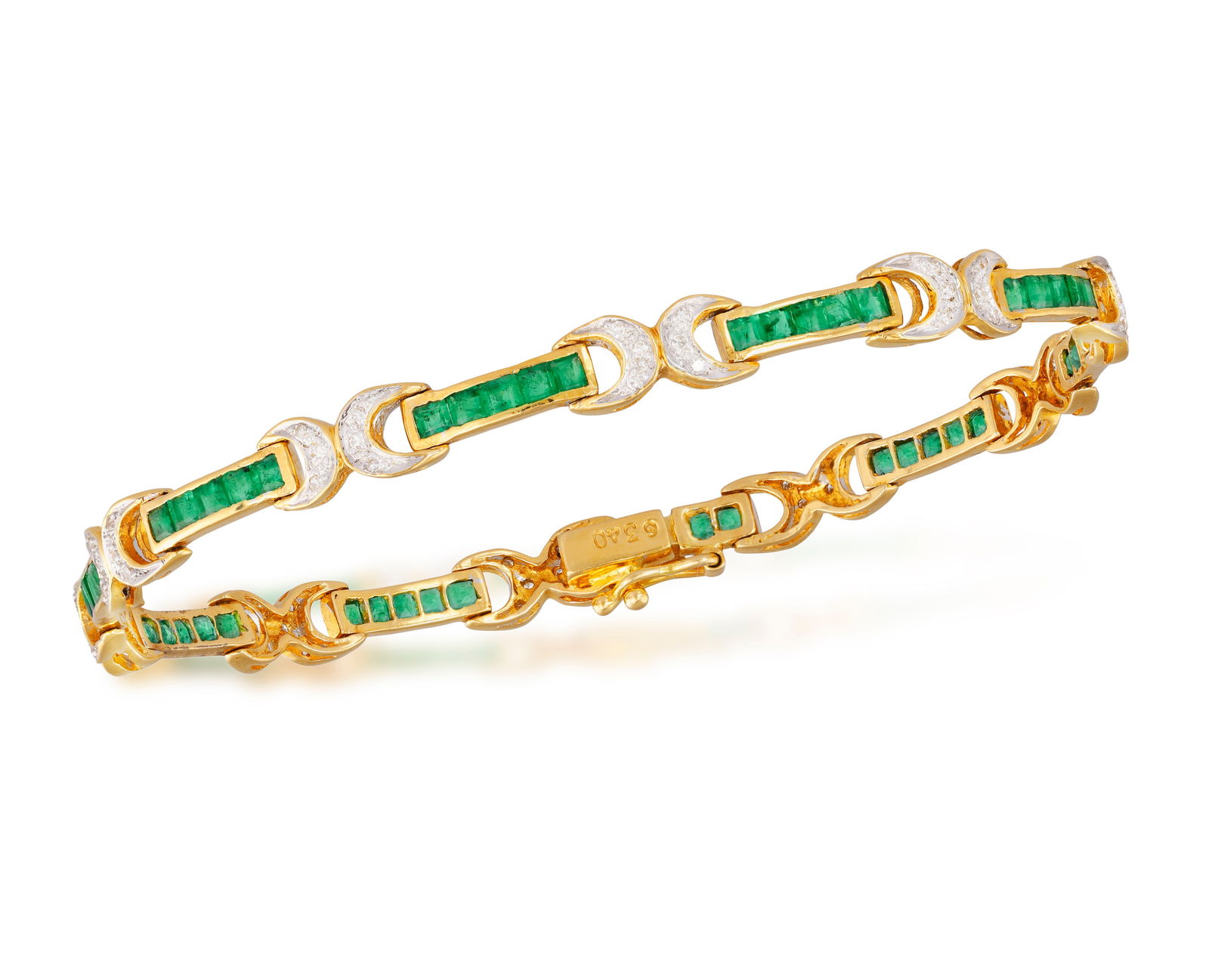 AN EMERALD AND DIAMOND LINE BRACELET  Composed of rectangular links channel-set with calibré (1 of 4)