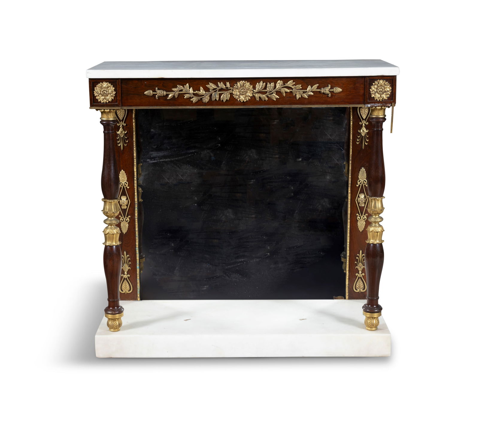 A REGENCY ROSEWOOD RECTANGULAR CONSOLE TABLE, CIRCA 1815 the white marble top above a frieze: A REGENCY ROSEWOOD RECTANGULAR CONSOLE TABLE, CIRCA 1815 the white marble top above a frieze decorated with cast foliage and rosettes, on baluster turned supports, with cast gilt collars, mirrored bac