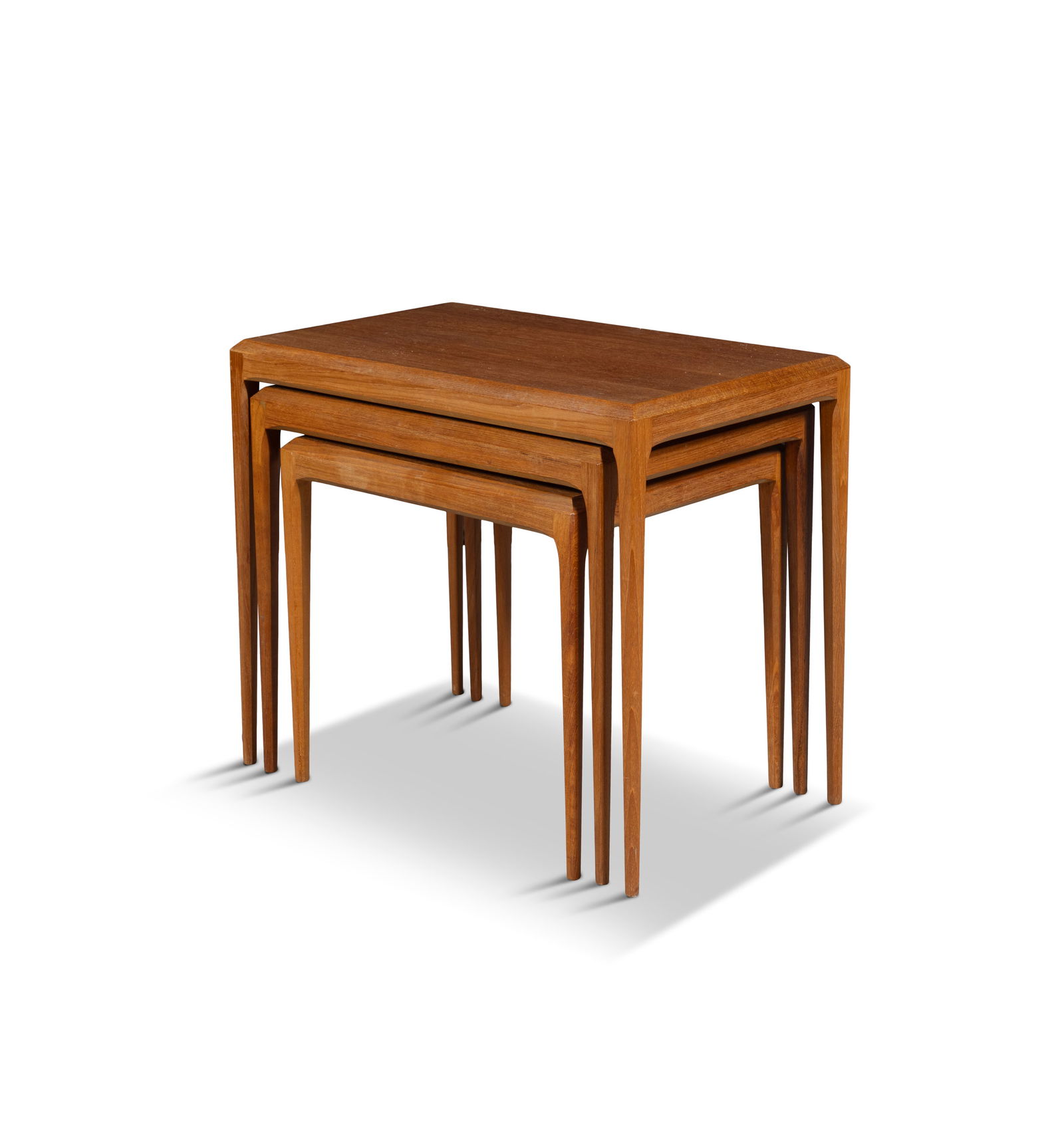 JOHANNES ANDERSEN (1903-1997) A teak nest of 3 side tables by Johannes Anderson for Silkeborg, 60 x: JOHANNES ANDERSEN (1903-1997) A teak nest of 3 side tables by Johannes Anderson for Silkeborg, 60 x 36.5 x 51cm (h)