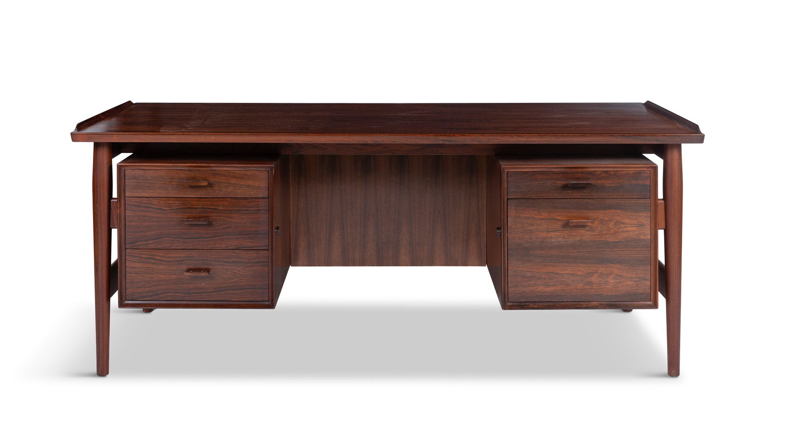 ARNE VODDER (1926-2009) A rosewood desk by Arne Vodder by Sibast, with maker’s label.: ARNE VODDER (1926-2009) A rosewood desk by Arne Vodder by Sibast, with maker’s label. Denmark, c.1960. 178.5 × 79.5 × 73 cm (h)
