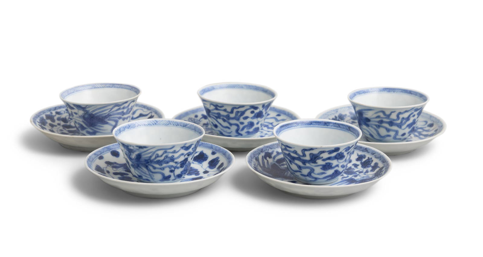 FIVE ‘TWO PHOENIX’ PATTERN BLUE AND WHITE TEABOWLS AND SAUCERS China, Yongzheng period,