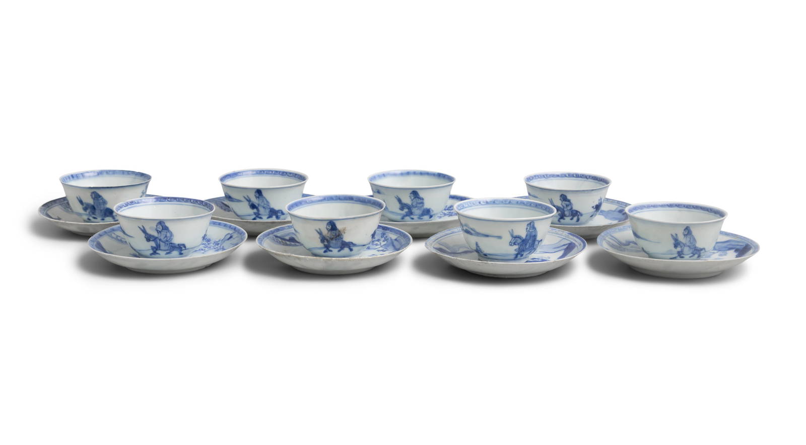 EIGHT ‘SEARCH FOR PLUM-BLOSSOM’ PATTERN BLUE AND WHITE TEABOWLS AND SAUCERS China,